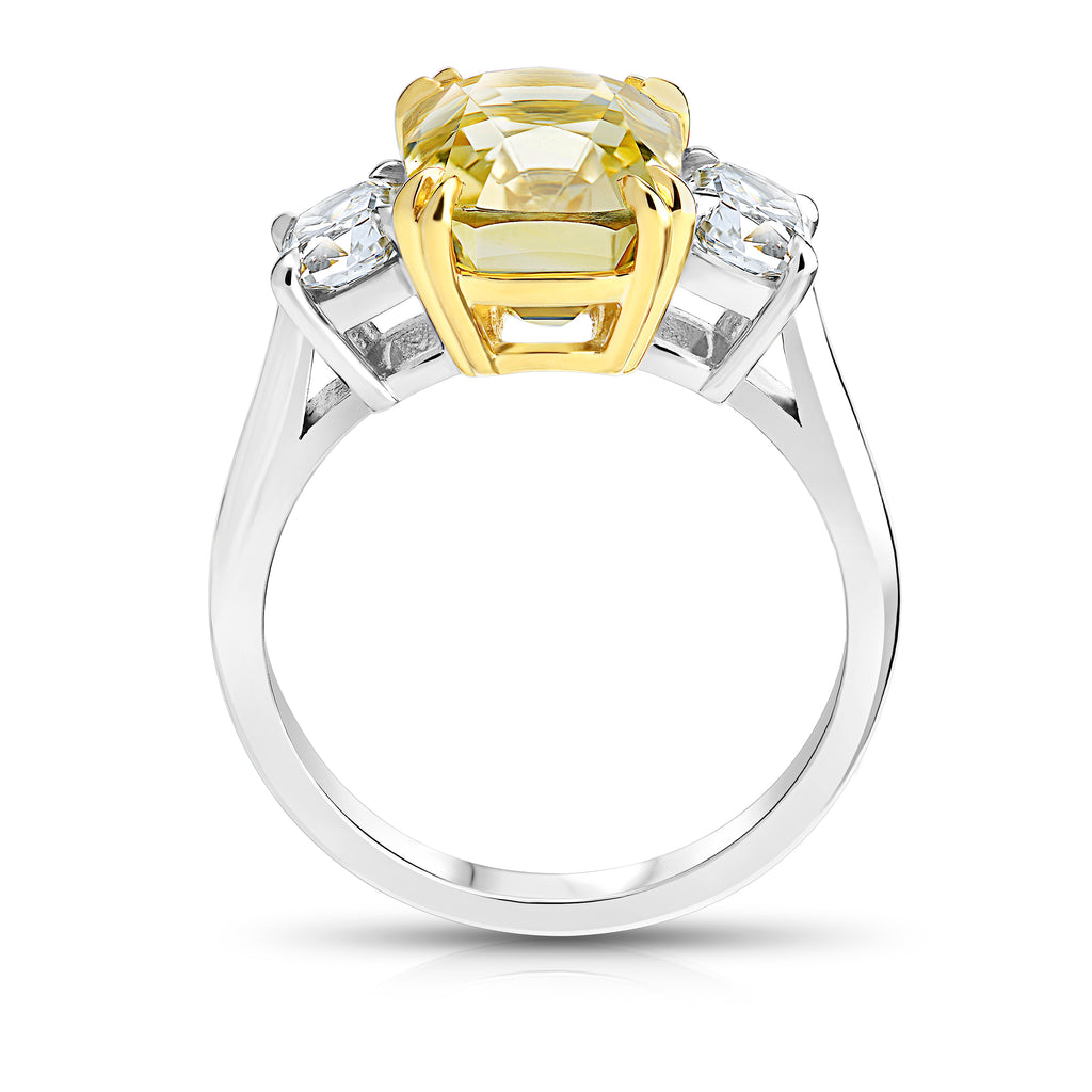 6.22 Carat Cushion Yellow Sapphire and a Diamond Platinum Ring