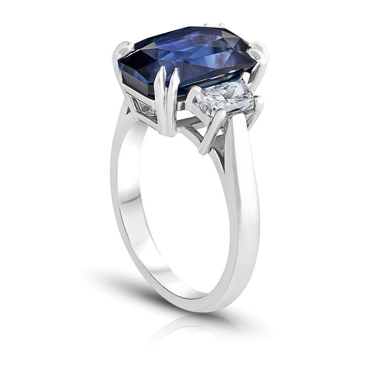 7.29 Carat Radiant Blue Sapphire and a Platinum Diamond Ring