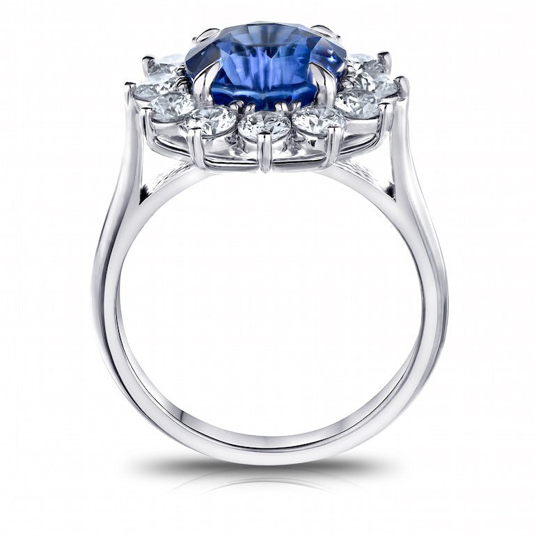 4.85 Carat Round Blue Sapphire and a Diamond Platinum Ring
