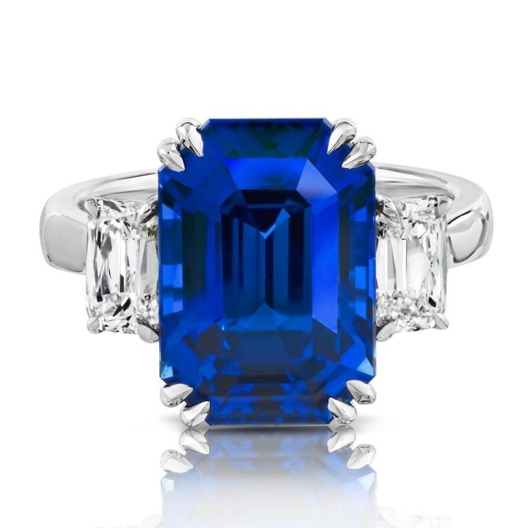 9.09 carat Cushion Blue Sapphire (H) and Diamond Platinum ring