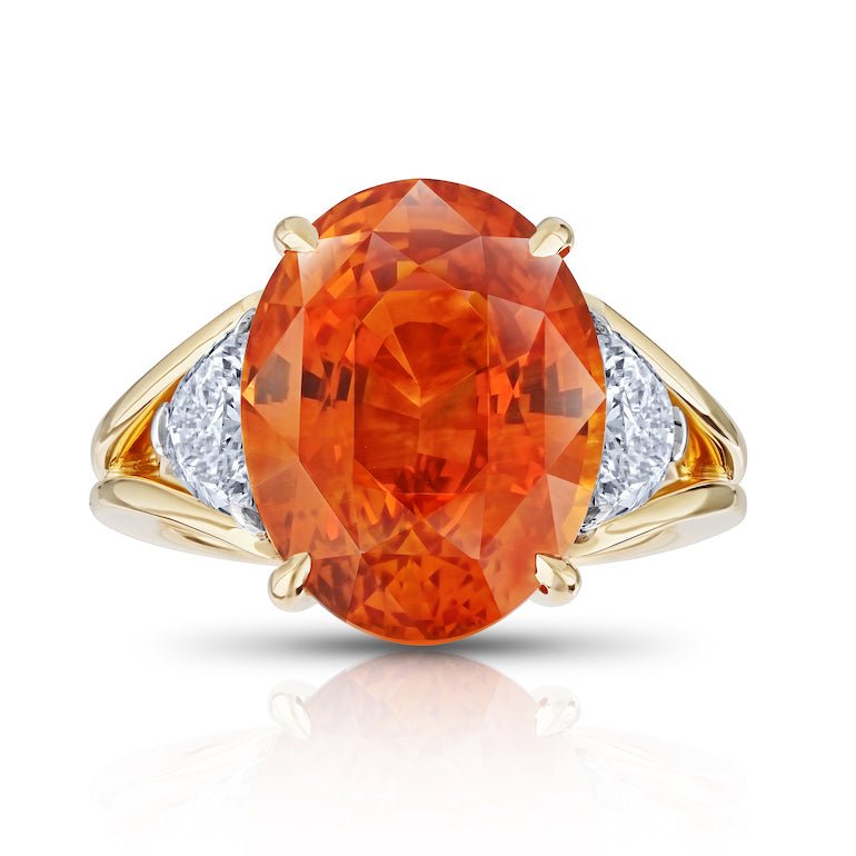 12.04 carat Oval Orange Sapphire with two Half Moon Diamonds in 18k YG ring