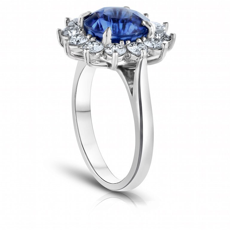 4.85 Carat Round Blue Sapphire and a Diamond Platinum Ring