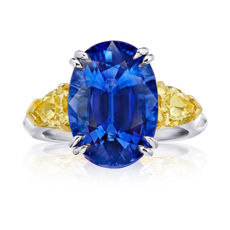 9.08 Carat Oval Blue Sapphire and Fancy Yellow Diamond Ring 9.08 Carat Oval Blue Sapphire and Fancy Yellow Diamond Ring