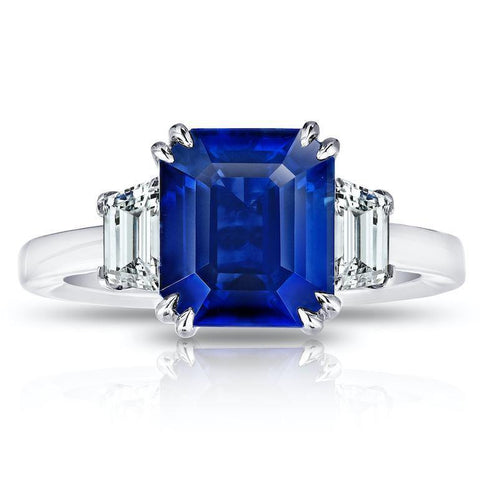 5.73 Carat Oval Blue Sapphire and Diamond Ring