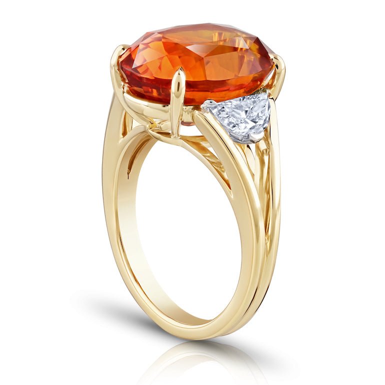 12.04 carat Oval Orange Sapphire with two Half Moon Diamonds in 18k YG ring - David Gross Group
